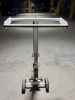 MANUAL MATERIAL LIFT / HAND TRUCK WITH TELESCOPING UPRIGHT, TWO-WHEEL BASE, WIDE TOP SUPPORT FRAME, AND STEEL LOAD PLATE. RATED FOR A 500-LB - 4