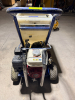 GRACO GAS-POWERED TEXTURE SPRAYER WITH LARGE MATERIAL HOPPER, PNEUMATIC DIAPHRAGM PUMP, PRESSURE GAUGES, ADJUSTABLE CONTROLS, HEAVY-DUTY STEEL CART, PNEUMATIC TIRES, AND PUSH HANDLE. - 7