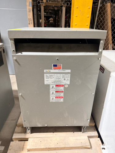 DRY-TYPE MOTOR DRIVE ISOLATION TRANSFORMER WITH VENTILATED STEEL ENCLOSURE, REMOVABLE ACCESS PANELS, AND FLOOR-MOUNTING FEET. UNIT IS RATED AT 40 KVA AND HAS A MULTI-VOLTAGE PRIMARY WITH 400Y/231-VOLT SECONDARY.