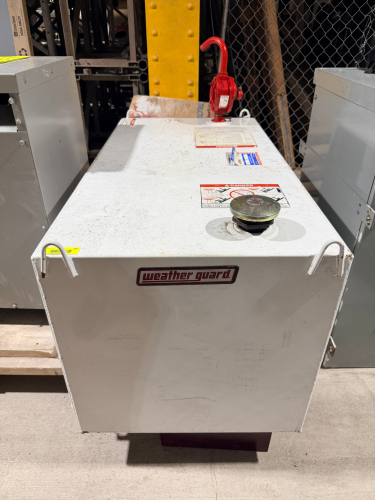 WEATHER GUARD RECTANGULAR STEEL LIQUID TRANSFER TANK WITH WHITE POWDER-COATED FINISH, FILL CAP, TOP-MOUNTED ROTARY HAND PUMP, DISPENSING SPOUT, SHUTOFF VALVE, BRAIDED FLEXIBLE HOSE, AND MOUNTING FLANGES.