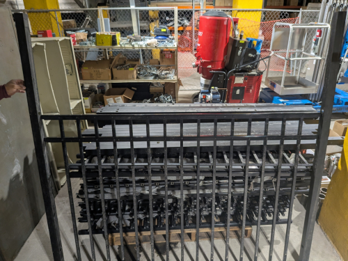 LARGE LOT OF METAL FENCING SECTIONS AND POSTS.