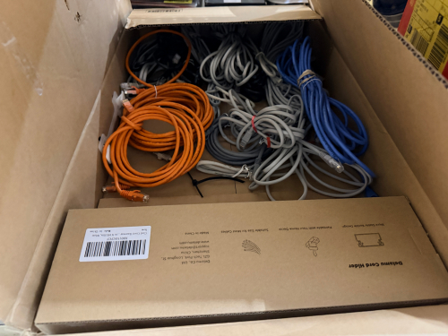 BOX OF ASSORTED ETHERNET / PATCH CABLES.