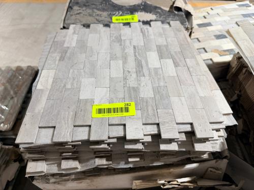 (4) BOXES OF LIGHT GRAY AND WHITE NATURAL STONE MOSAIC TILE SHEETS FEATURING RECTANGULAR PIECES ARRANGED IN A STAGGERED LINEAR PATTERN. T