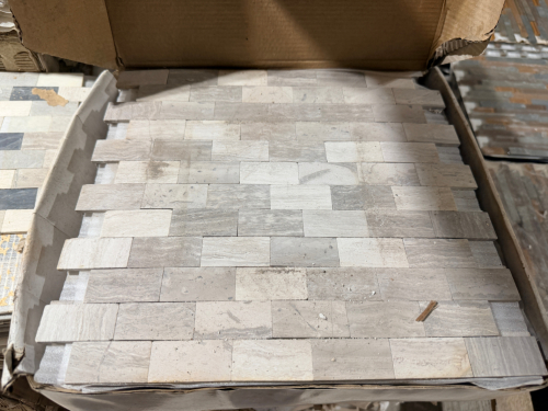 (4) BOXES OF LIGHT GRAY AND WHITE NATURAL STONE MOSAIC TILE SHEETS FEATURING RECTANGULAR PIECES ARRANGED IN A STAGGERED LINEAR PATTERN. T
