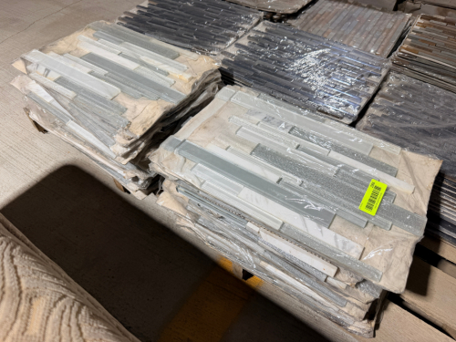 (24) SHEETS OF CLARITY GLASS AND STONE BLEND RANDOM STRIP MOSAIC TILE SHEETS FEATURING LINEAR GLASS AND NATURAL STONE PIECES IN WHITE, LIGHT GRAY, SILVER, AND TRANSLUCENT TONES.