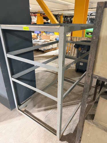 HEAVY-DUTY OPEN STEEL STORAGE RACK FRAME CONSTRUCTED WITH WELDED SQUARE-TUBE STEEL. FEATURES FOUR UPRIGHT CORNER POSTS WITH MULTIPLE HORIZONTAL SUPPORT RAILS AND AN OPEN TOP AND SIDES.