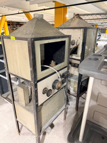 (2) VINTAGE INDUSTRIAL ELECTROZONE AIR CONDITIONING / ENGINEERING UNIT WITH METAL CABINET, PYRAMID-SHAPED EXHAUST HOOD, OPEN FRONT CHAMBER, ANALOG GAUGES, CONTROL SWITCHES, INTERNAL INSULATORS, AND LOWER RESERVOIR-STYLE ENCLOSURE.