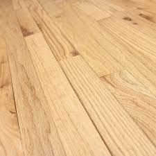(6) BOXES OF TIMBERLAND PREFINISHED OAK HARDWOOD FLOORING WITH TONGUE-AND-GROOVE CONSTRUCTION AND NATURAL FINISH.