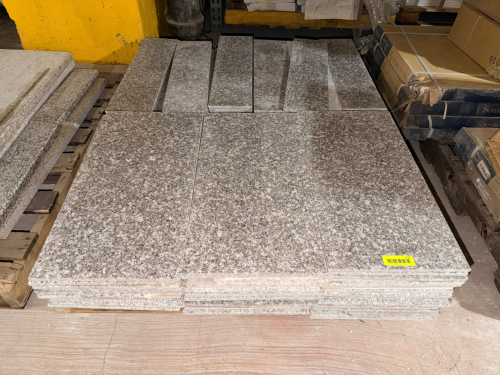 LOT OF POLISHED NATURAL STONE TILES AND TRIM PIECES WITH SPECKLED BROWN, GRAY, BLACK, AND CREAM COLORATION