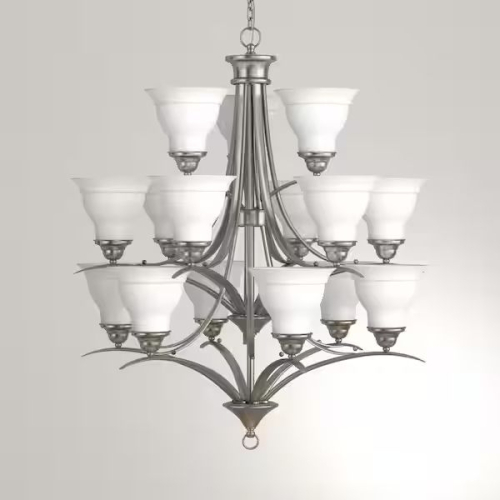 OXFORD SILVER NINE-LIGHT CHANDELIER WITH ORNATE SCROLLED FRAME, DECORATIVE CENTER COLUMN, CURVED ARMS, AND CANDLE-STYLE LIGHT HOLDERS.
