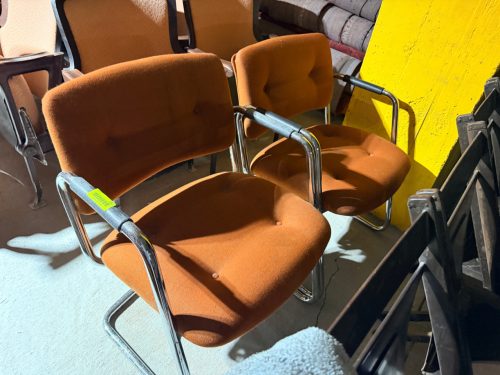 (2) BURNT ORANGE UPHOLSTERED SIDE CHAIRS W/ CHROME FRAMES.
