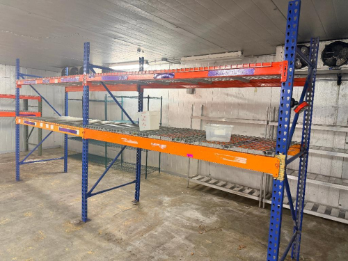 (2) 8' X 42" SECTIONS OF HEAVY-DUTY STEEL PALLET RACKING WITH ORANGE HORIZONTAL LOAD BEAMS, BLUE STEEL UPRIGHTS, AND WIRE DECKING. EACH SECTION INCLUDES TWO ELEVATED STORAGE LEVELS WITH WIRE DECK PANELS.