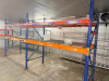 (2) 8' X 42" SECTIONS OF HEAVY-DUTY STEEL PALLET RACKING WITH ORANGE HORIZONTAL LOAD BEAMS, BLUE STEEL UPRIGHTS, AND WIRE DECKING. EACH SECTION INCLUDES TWO ELEVATED STORAGE LEVELS WITH WIRE DECK PANELS.