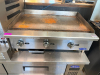 COOKRITE COMMERCIAL PROPANE COUNTERTOP GRIDDLE WITH STAINLESS STEEL BODY, 36" FLAT STEEL COOKING SURFACE, THREE INDEPENDENT BURNER CONTROLS, REAR AND SIDE SPLASH GUARDS, AND FRONT GREASE COLLECTION DRAWER. - 2