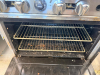 ATOSA SIX-BURNER GAS RANGE WITH STANDARD OVEN BASE, CAST-IRON OPEN-TOP BURNERS AND GRATES, INDIVIDUAL BURNER CONTROLS, OVEN TEMPERATURE CONTROL, TWO OVEN RACKS, STAINLESS STEEL FRONT, AND HIGH BACKSPLASH WITH OVERSHELF. - 4
