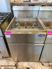 ATOSA FLOOR-MODEL PROPANE DEEP FRYER WITH STAINLESS STEEL EXTERIOR, DUAL FRY BASKETS, TUBE-TYPE BURNER SYSTEM, FRONT DRAIN VALVE, AND INTEGRATED SPLASH/BACKGUARD.