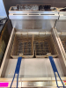ATOSA FLOOR-MODEL PROPANE DEEP FRYER WITH STAINLESS STEEL EXTERIOR, DUAL FRY BASKETS, TUBE-TYPE BURNER SYSTEM, FRONT DRAIN VALVE, AND INTEGRATED SPLASH/BACKGUARD. - 2
