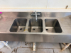 60"' THREE-COMPARTMENT STAINLESS STEEL SINK WITH THREE DEEP WASH BASINS, DUAL INTEGRAL DRAINBOARDS, HIGH BACKSPLASH, DECK-MOUNTED HOT/COLD FAUCET WITH SWING SPOUT, AND GALVANIZED SUPPORT LEGS - 2