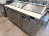 ATOSA THREE-DOOR REFRIGERATED SALAD PREP TABLE WITH STAINLESS STEEL EXTERIOR AND INTERIOR, FULL-LENGTH POLY CUTTING BOARD, DUAL HINGED STAINLESS STEEL PAN COVERS, THREE SOLID DOORS WITH RECESSED HANDLES, AND ADJUSTABLE WIRE SHELVING. - 2