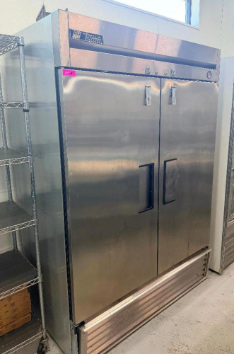 TRUE TWO-DOOR REACH-IN FREEZER WITH STAINLESS STEEL EXTERIOR, FULL-HEIGHT HINGED DOORS, POSITIVE-LATCH HANDLES, DOOR LOCKS, BOTTOM-MOUNTED REFRIGERATION SYSTEM, AND ADJUSTABLE INTERIOR SHELF SUPPORTS. INTERIOR SHELVES ARE NOT SHOWN