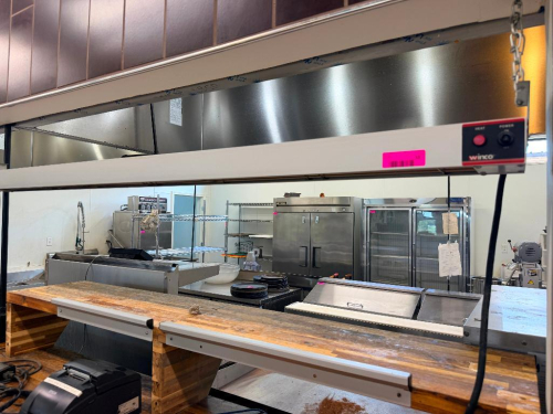 COMMERCIAL ELECTRIC INFRARED STRIP HEATER WITH 72" HEATING ELEMENT, METAL HOUSING, HEAT INDICATOR LIGHT, AND ON/OFF POWER SWITCH.