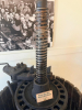 ANTIQUE WOODEN BASKET WINE / FRUIT PRESS WITH HEAVY CAST IRON FRAME, LARGE THREADED SCREW PRESS, CIRCULAR WOOD SLAT BASKET, STEEL BANDS, PRESSING PLATEN, AND CAST IRON THREE-LEG BASE. UNIT SHOWS HEAVY AGE-RELATED PATINA, SURFACE RUST, WOOD WEATHERING, AND - 3