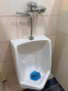 COMPLETE COMMERCIAL RESTROOM FIXTURE PACKAGE INCLUDING DOUBLE-SINK VANITY WITH SOLID SURFACE TOP, TWO INTEGRATED SINK BASINS, TWO FAUCETS, MIRROR, WALL-MOUNTED LIGHT FIXTURE, TWO WALL-MOUNTED URINALS, TWO TOILETS, TOILET/URINAL PARTITIONS, PAPER TOWEL DIS - 6