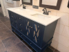 COMMERCIAL RESTROOM FIXTURE PACKAGE INCLUDING DOUBLE-SINK VANITY WITH WHITE SOLID SURFACE TOP, TWO UNDERMOUNT SINK BASINS, TWO BLACK FAUCETS, TWO FRAMED WALL MIRRORS, TWO BLACK WALL-MOUNTED LIGHT FIXTURES, TWO TOILETS, TOILET PARTITIONS, PAPER TOWEL DISPE - 3
