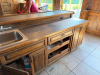 60'X 14' " U " SHAPED CUSTOM-BUILT U-SHAPED COMMERCIAL BAR WITH RUSTIC WOOD CONSTRUCTION, RAISED BAR TOP, LOWER WORK COUNTERS, EXTENSIVE BASE CABINETRY, DRAWERS, STORAGE COMPARTMENTS, DECORATIVE WOOD PANELS, HEAVY TIMBER POSTS, OVERHEAD WOOD BEAM/CANOPY S - 16