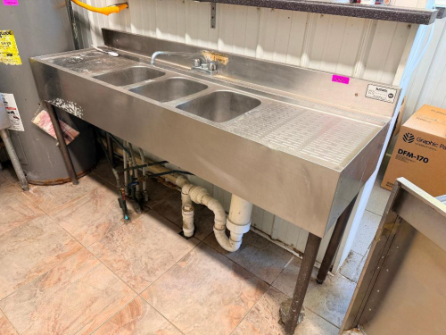 KROWNE THREE-COMPARTMENT STAINLESS STEEL SINK WITH INTEGRAL DRAINBOARDS ON BOTH SIDES, HIGH BACKSPLASH, DEEP SINK COMPARTMENTS, DECK-MOUNTED FAUCET AND GALVANIZED TUBULAR LEGS.