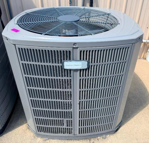 AMERICAN STANDARD OUTDOOR AIR CONDITIONING CONDENSING UNIT WITH TOP-MOUNTED FAN, PROTECTIVE COIL CABINET, AND SINGLE COMPRESSOR SYSTEM.
