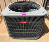 COMMERCIAL OUTDOOR AIR CONDITIONING CONDENSING UNIT WITH TOP-MOUNTED FAN, PROTECTIVE COIL GUARD, AND SINGLE COMPRESSOR SYSTEM.
