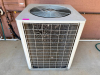 COMMERCIAL OUTDOOR AIR CONDITIONING CONDENSING UNIT WITH TOP-MOUNTED FAN, PROTECTIVE COIL GUARD, AND SINGLE COMPRESSOR SYSTEM.