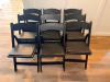 (12) BLACK WOOD FOLDING CHAIRS WITH PADDED BLACK VINYL SEATS AND CURVED SOLID BACKRESTS. - 2