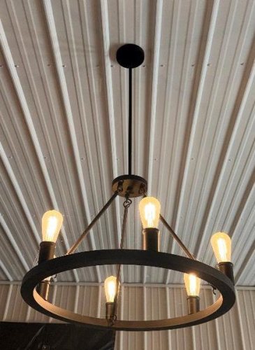 (2) ROUND BLACK METAL RING CHANDELIER WITH (6) EXPOSED EDISON-STYLE BULBS, CIRCULAR FRAME, AND THREE-POINT SUSPENSION SUPPORT.