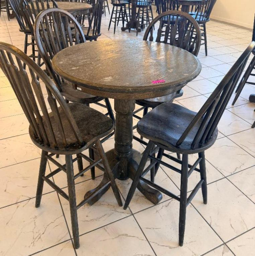 36" ROUND COUNTER-HEIGHT WOOD PEDESTAL TABLE WITH FOUR MATCHING WINDSOR-BACK WOOD CHAIRS. TABLE FEATURES A THICK ROUND TOP, TURNED CENTER PEDESTAL, AND FOUR-FOOT BASE. CHAIRS FEATURE TALL SPINDLE BACKS, SOLID WOOD SEATS, FOOTREST/STRETCHER SUPPORTS, AND D