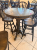 36" ROUND COUNTER-HEIGHT WOOD PEDESTAL TABLE WITH FOUR MATCHING WINDSOR-BACK WOOD CHAIRS. TABLE FEATURES A THICK ROUND TOP, TURNED CENTER PEDESTAL, AND FOUR-FOOT BASE. CHAIRS FEATURE TALL SPINDLE BACKS, SOLID WOOD SEATS, FOOTREST/STRETCHER SUPPORTS, AND D - 3