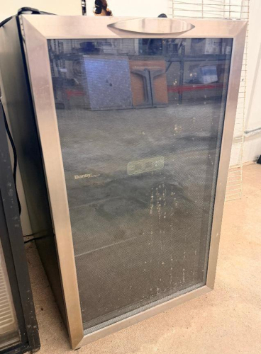 FREESTANDING WINE COOLER / BEVERAGE REFRIGERATOR WITH BLACK CABINET, STAINLESS STEEL FRAMED GLASS DOOR, INTERIOR WOOD SHELVING, AND FRONT DOOR HANDLE