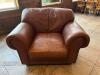 (1) BROWN LEATHER OVERSIZED ARMCHAIR