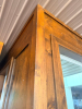 LOT OF WOOD WALL PANELING AND TRIM LOCATED THROUGHOUT THE BAR AREA, CONSISTING OF STAINED WOOD VERTICAL PANELS, RAISED FRAME AND PANEL SECTIONS, HORIZONTAL AND VERTICAL TRIM, WINDOW SURROUNDS, CORNER TRIM, AND ASSOCIATED WOOD COMPONENTS AS SHOWN. PANELING - 5