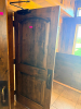 SOLID CORE WOOD DOOR WITH STAINED FINISH, ARCHED RAISED PANEL DESIGN, HEAVY-DUTY HINGES, METAL PULL HANDLE, AND OVERHEAD HYDRAULIC DOOR CLOSER. - 2