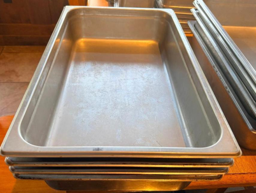 (4) FULL SIZE STAINLESS INSERTS.