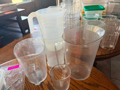 (4) ASSORTED PLASTIC PITCHERS / MEASURING CUPS.