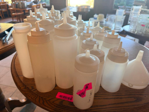 (1) LOT OF ASSORTED PLASTIC SQUEEZE BOTTLES.
