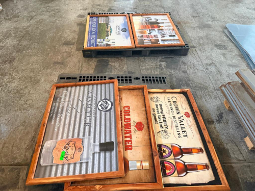 (2) PALLETS OF ASSORTED FRAMED ADVERTISING POSTERS.