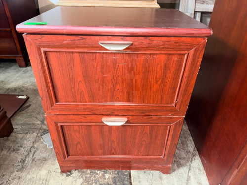 TWO-DRAWER LATERAL FILE CABINET WITH CHERRY WOOD-GRAIN FINISH, RAISED-PANEL DRAWER FRONTS, AND BRUSHED METAL PULLS. VISIBLE SCRATCHES, SCUFFING.