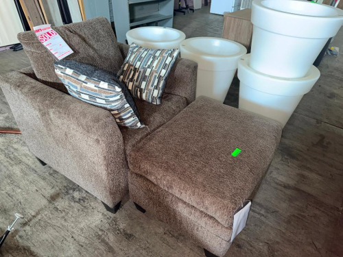OVERSIZED UPHOLSTERED CHAIR WITH MATCHING OTTOMAN, BROWN TEXTURED FABRIC, LOOSE BACK CUSHION, WIDE PADDED ARMS, ACCENT PILLOWS, AND DARK FINISHED FEET. MATCHING OTTOMAN FEATURES A LARGE PADDED UPHOLSTERED TOP
