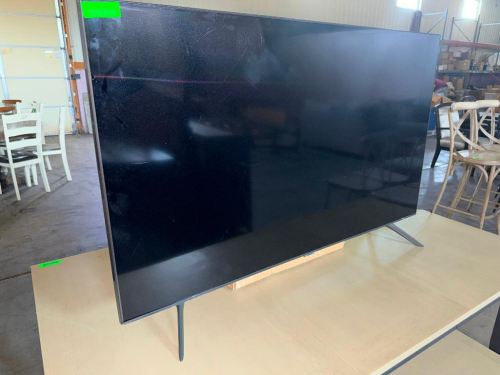 SAMSUNG 55" 4K UHD SMART LED TELEVISION WITH FLAT-PANEL DISPLAY, SLIM BLACK BEZEL, AND DUAL LEG STAND.