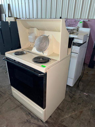 (2) FREESTANDING RANGES CONSISTING OF (1) ELECTRIC COIL-TOP RANGE WITH OVEN AND VENT HOOD ASSEMBLY AND (1) GAS RANGE WITH OVEN.