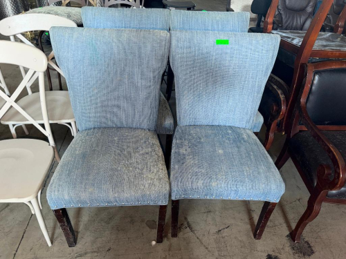 (4) MATCHING UPHOLSTERED DINING CHAIRS FEATURING BLUE-GRAY TEXTURED FABRIC, TALL PADDED BACKS, PADDED SEATS, NAIL HEAD TRIM, AND DARK FINISH WOOD LEGS.